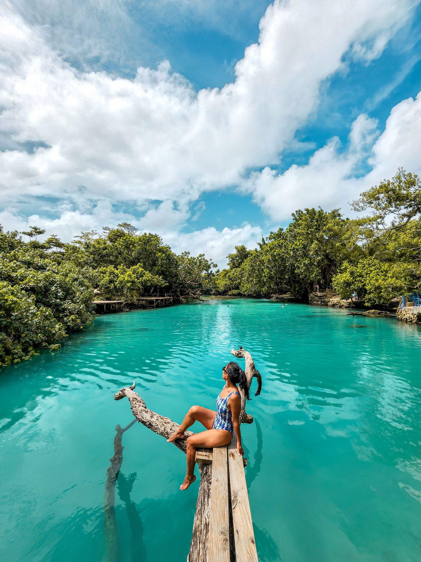 A turquoise lagoon edged with rainforest in Vanuatu
